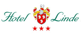 Logo Hotel Linde Donaueschingen mit Wappen, drei Sternen und Slogan 'since 1910 – Comfort and enjoyment'.